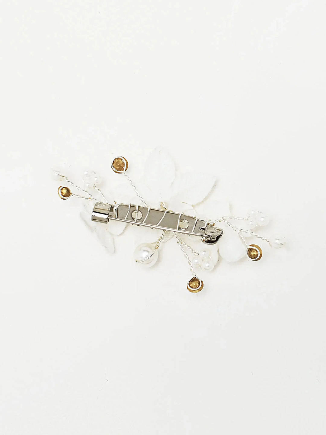 remonte-traîne fleuri avec perles et cristaux blanc ivoire pour robe de mariée vue arrièremariée