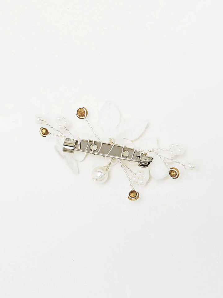 remonte-traîne fleuri avec perles et cristaux blanc ivoire pour robe de mariée vue arrièremariée