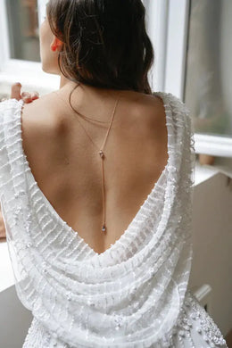 Collier de dos de mariée Ciel – pierres bleues, doré