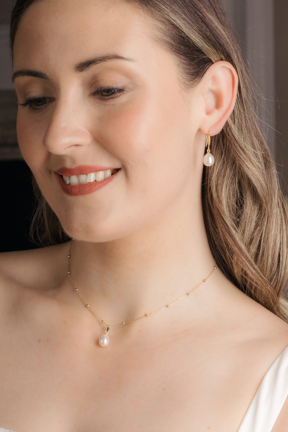 Collier de dos Seville et boucles d'oreilles Porto, finition or