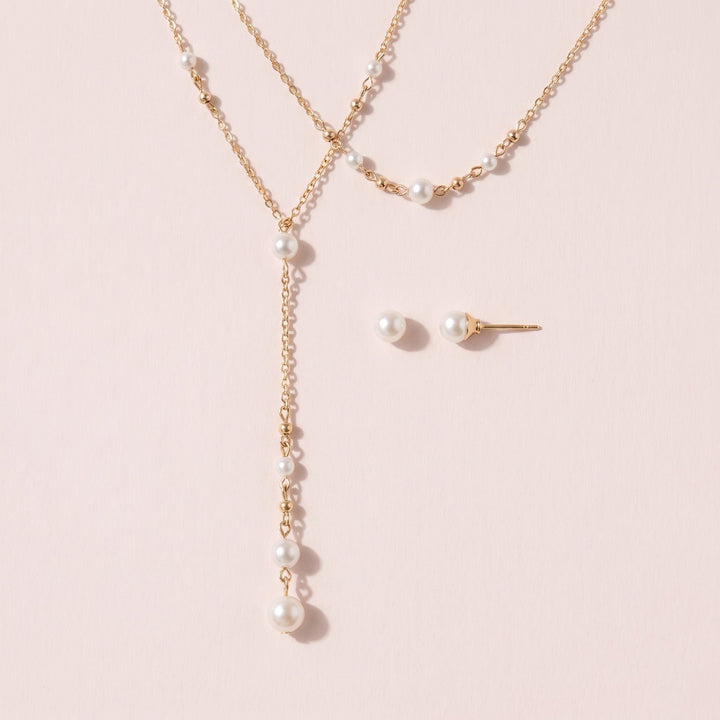 Parure de dos de mariée NS125420 sur fond rose clair