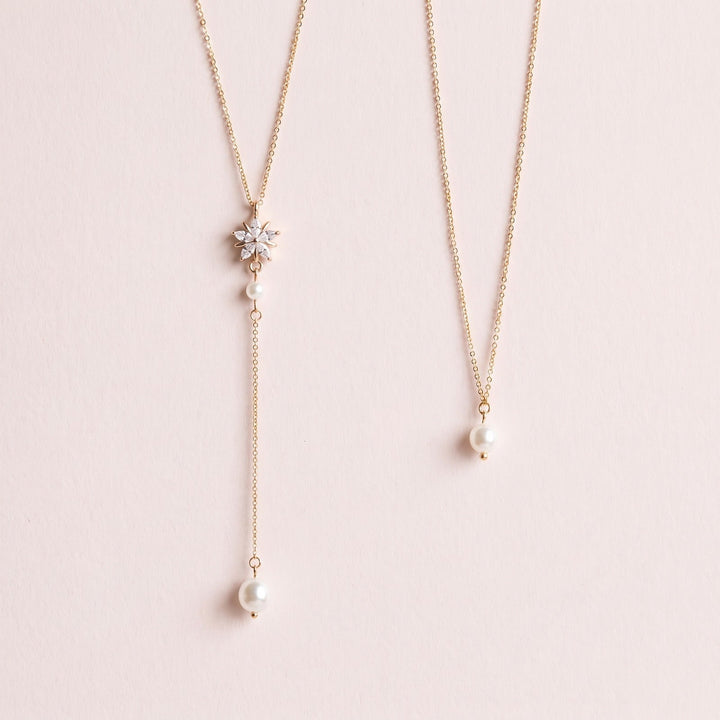 Parure de dos de mariée NS1723 sur fond rose clair