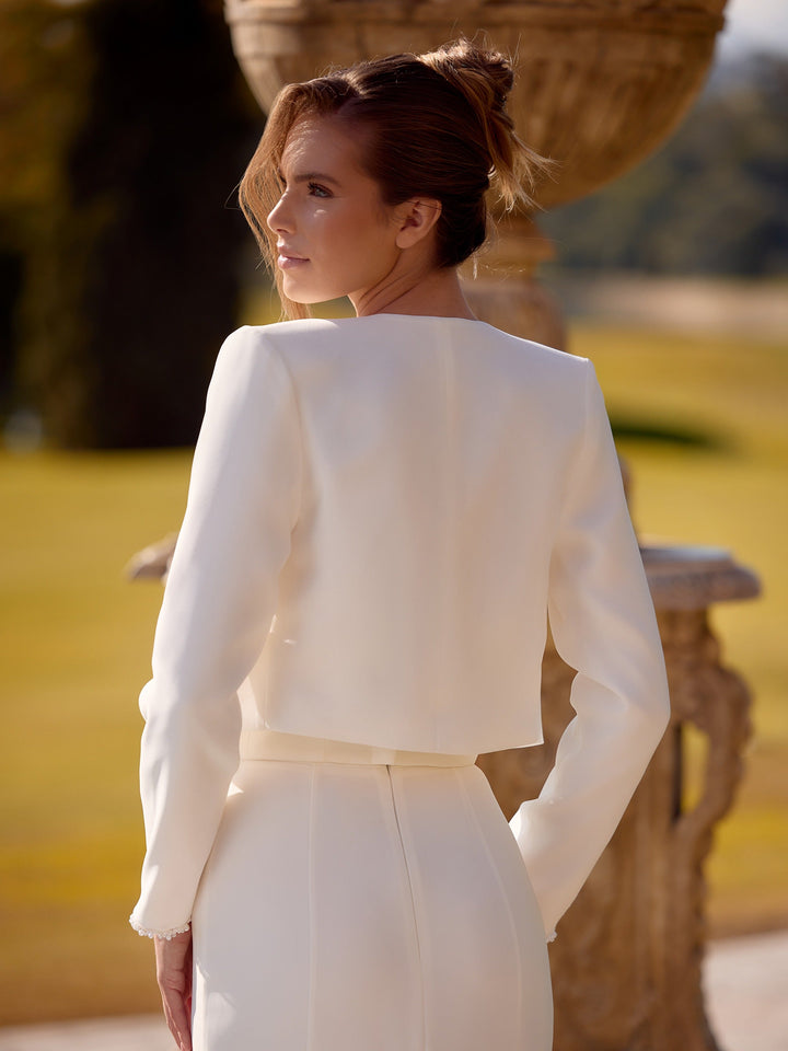 Dos de la veste de mariée E529 en crêpe stretch ivoire
