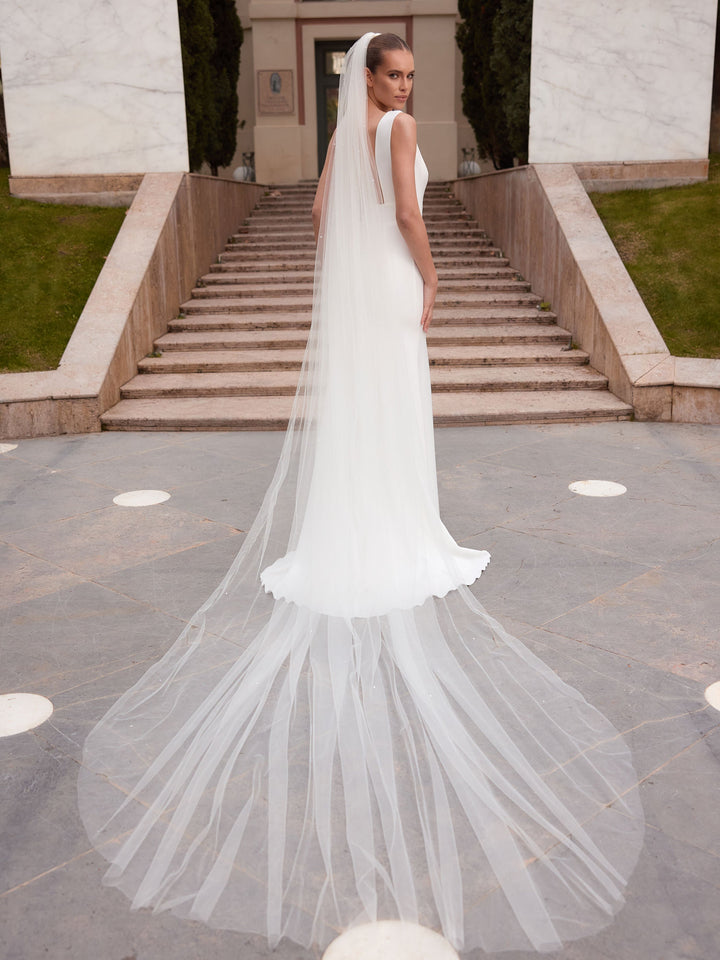Voile de mariée royal 350 cm en tulle souple ivoire semé de perles à bord coupé S553 Bianco Evento